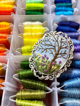 Embroidered tree and wildflowers brooch