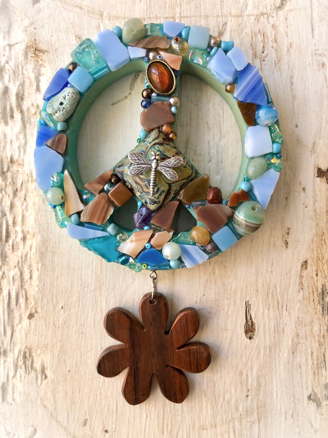 Mini peace mosaic with dragonfly